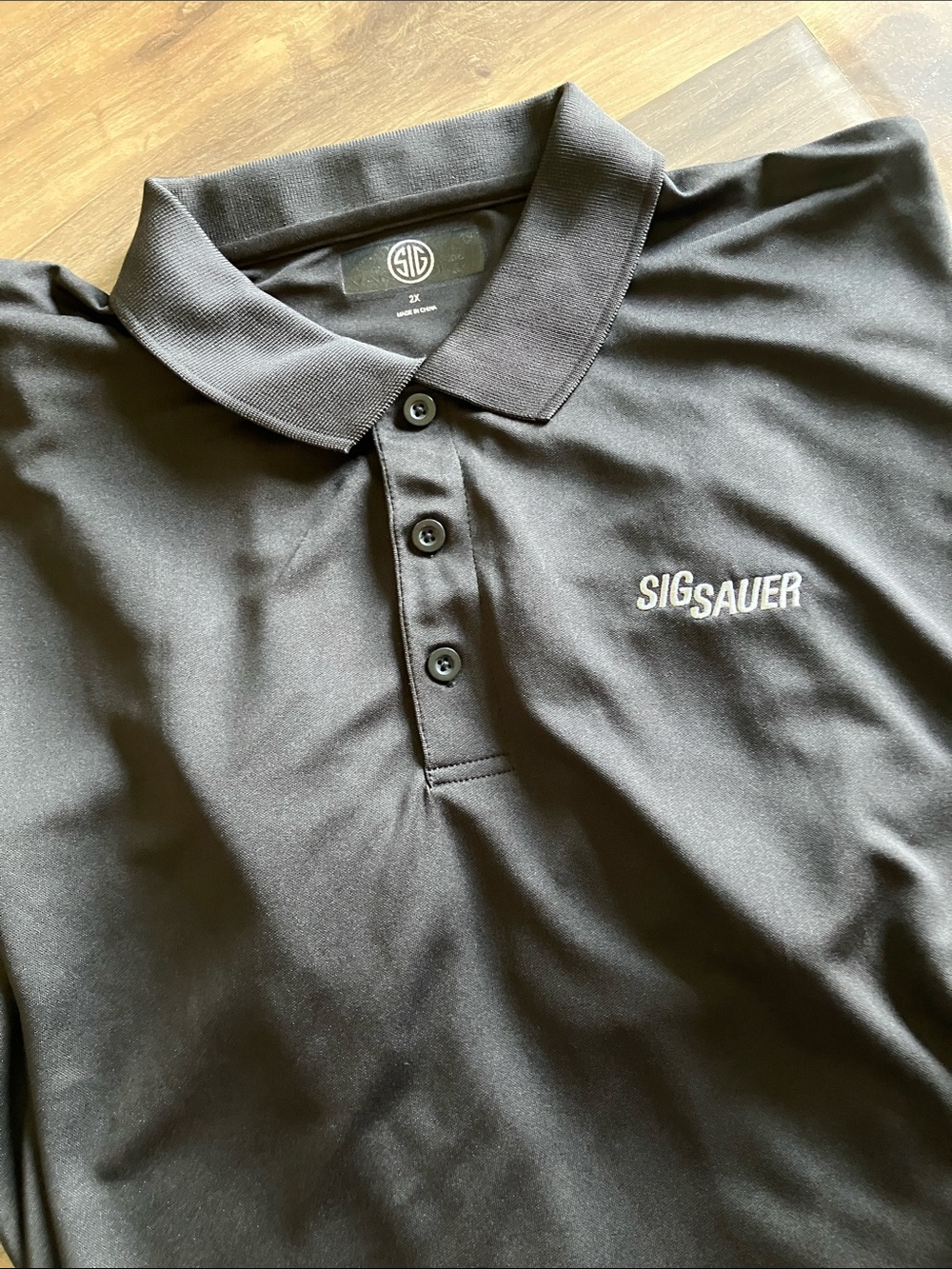 SIG SAUER BLACK POLO SHIRT
NWOT SIZE 2X